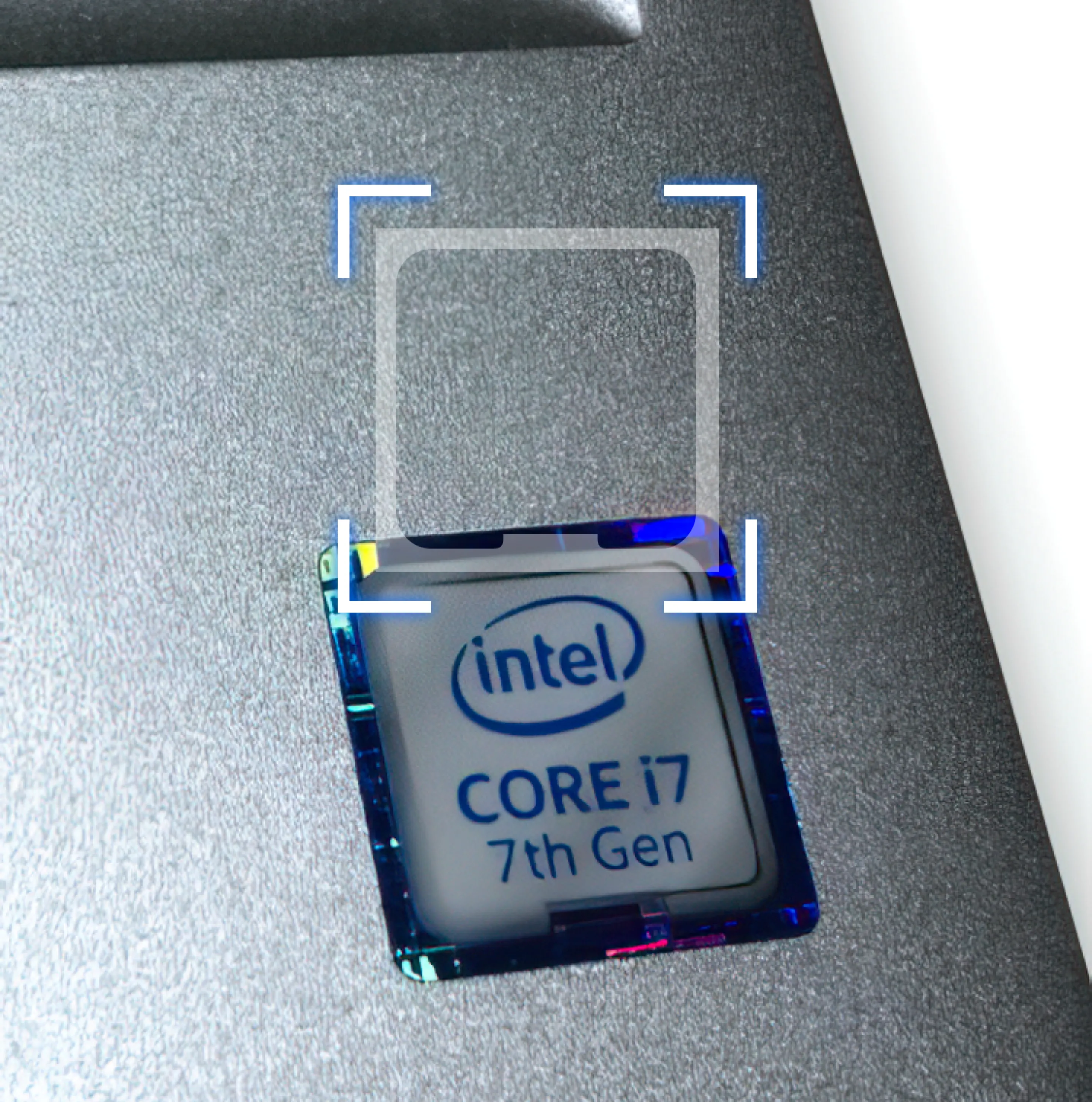 Screenshot of the app’s badge scanning feature showing the camera pointed at an Intel Core i7 7th Gen Badge